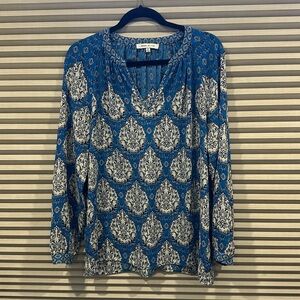 Blue and white patterned long sleeve blouse